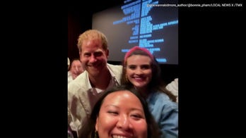 Prince Harry surprises fan at 'Heart of Invictus' screening