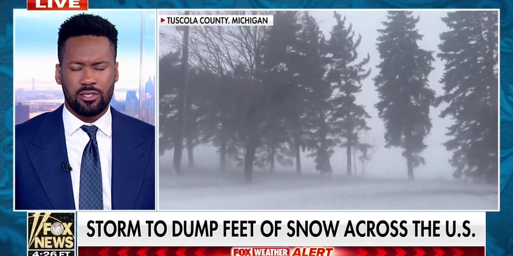 Major storm dumps feet of snow in New York, causes power outages