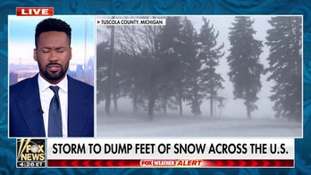 Major storm dumps feet of snow in New York, causes power outages