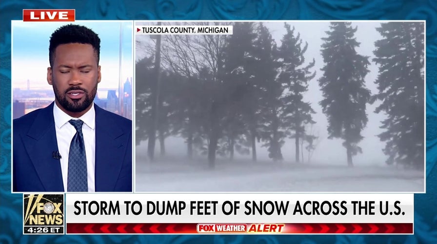 Major storm dumps feet of snow in New York, causes power outages