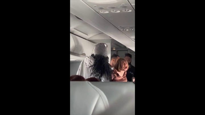 Flight descends into chaos when 'possessed' woman begins screaming: 'There's a real devil'