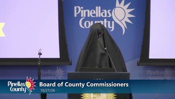 Woman covered in veil plays Islamic call to prayer at Florida commissioners' meeting