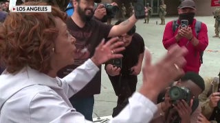 Rep. Maxine Waters shouts at armed agents during LA riots