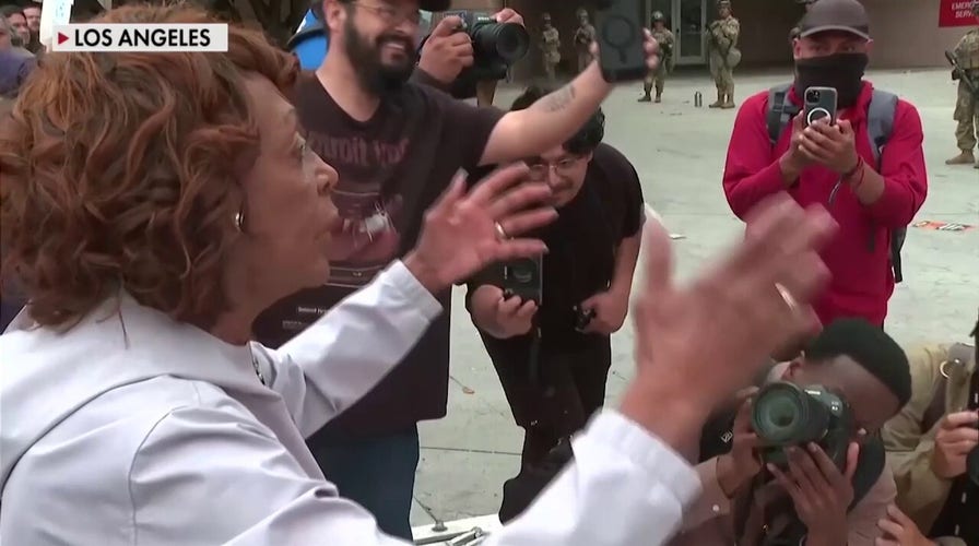 Rep. Maxine Waters shouts at armed agents during LA riots