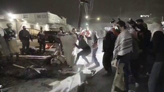 Keffiyeh-clad agitators toss objects at ICE agents in tense New Jersey detention center clashes