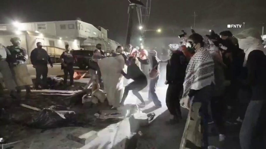 Keffiyeh-clad agitators toss objects at ICE agents in tense New Jersey detention center clashes