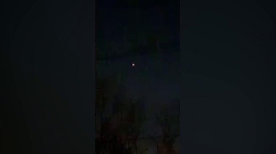 New Jersey resident captures video of suspected drones hovering outside her home