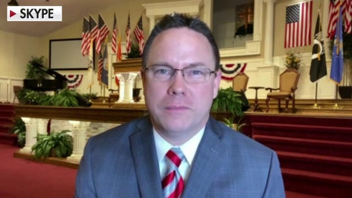 Pastor tears up cease-and-desist letter over in-person church services