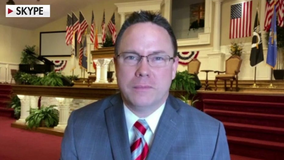 Pastor tears up cease-and-desist letter over in-person church services