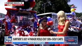 July 4 parade-goers sporting patriotic golf carts are ‘proud to be American’