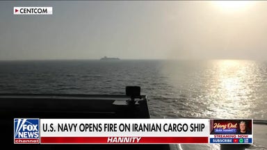 US Navy opens fire on Iranian cargo ship