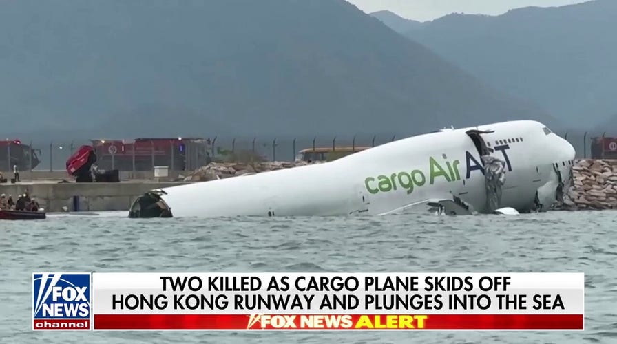 Two killed as cargo plane skids off Hong Kong runway, plunges into sea