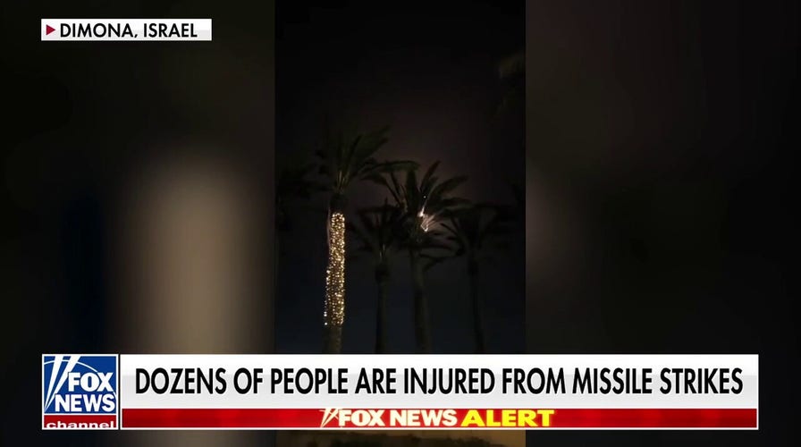 Iranian missiles deed Israeli confederate cities of Dimona and Arad