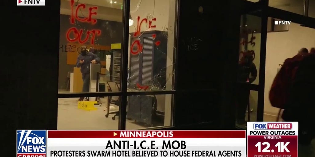 Agitators swarm hotel in protest of ICE agents