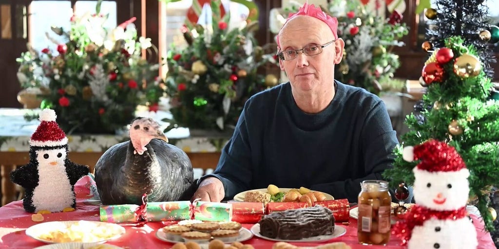 Man replaces roast turkey tradition by celebrating Christmas dinner with pet bird