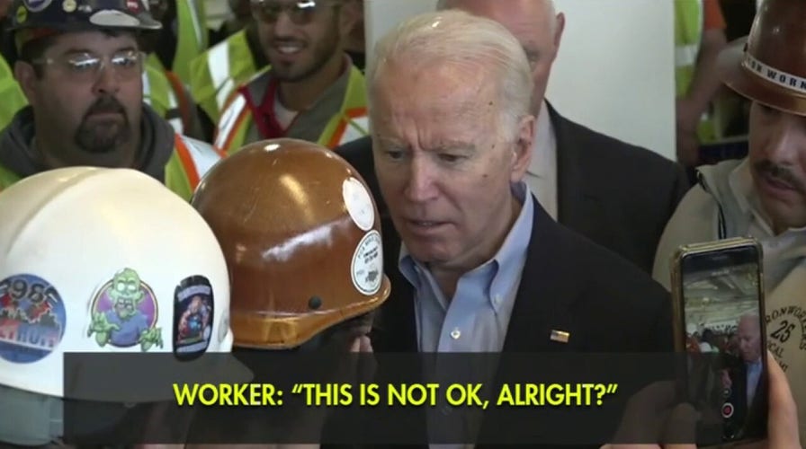 Joe Biden curses at Detroit voter during argument over gun control