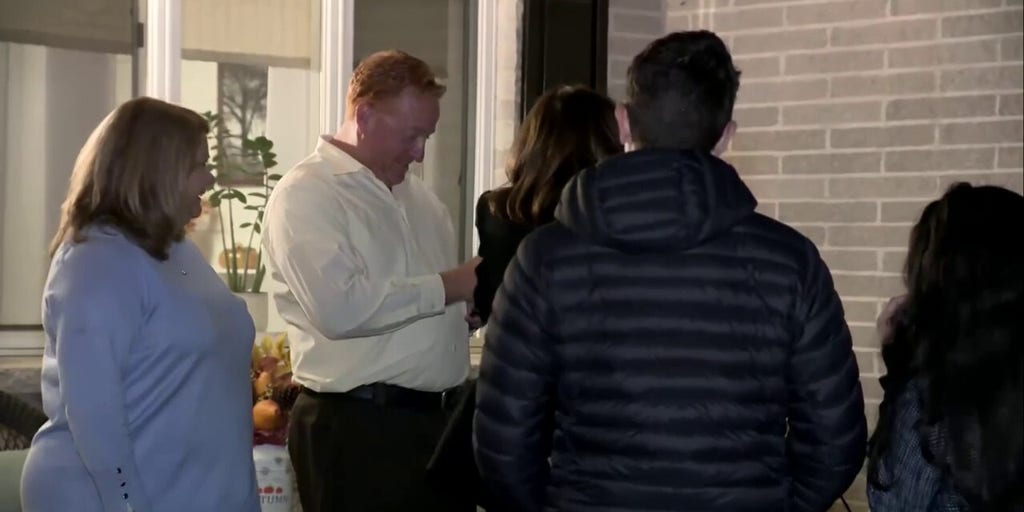 Harris greets Pennsylvania family on porch, asks them to stage 'door knock'