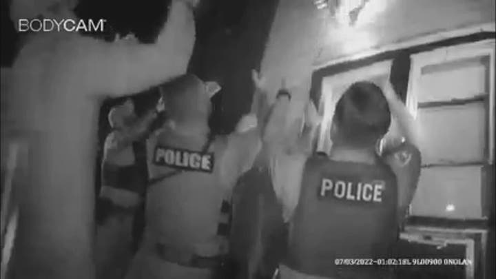 Indiana police catch family forced to jump out window of burning apartment
