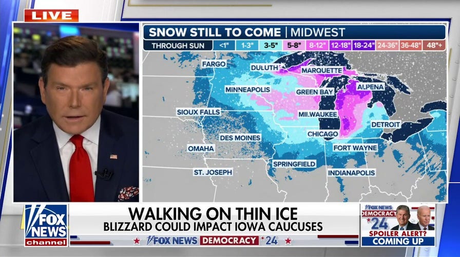 Canvassers reach out to Iowa voters as winter storm surges