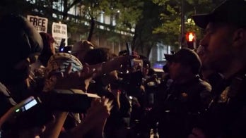 Police dismantle encampment after clash with protesters at GWU