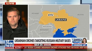 Ukrainians in Bucha working in freezing conditions to rebuild devastated community