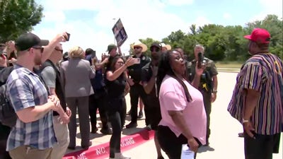 Heated exchanges erupt outside Karmelo Anthony murder trial