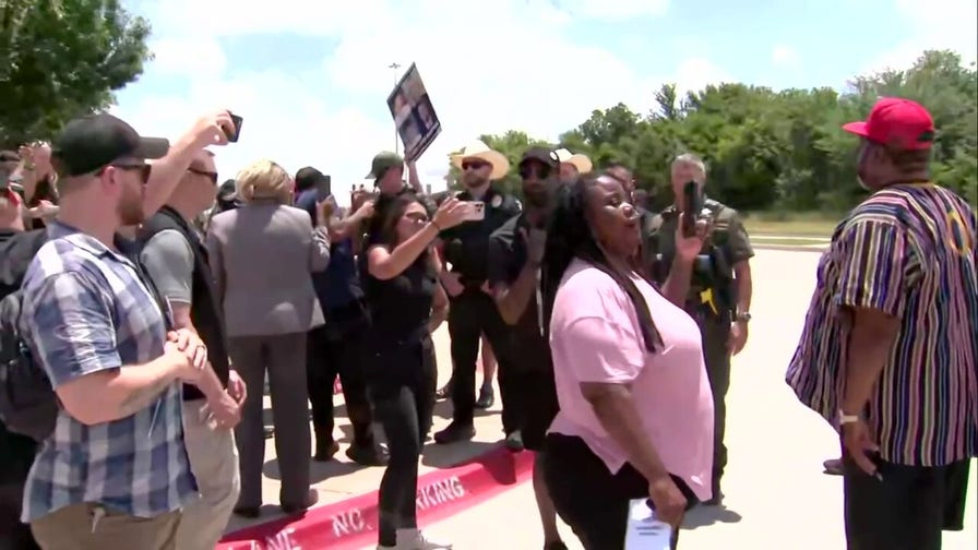 Heated exchanges erupt outside Karmelo Anthony murder trial