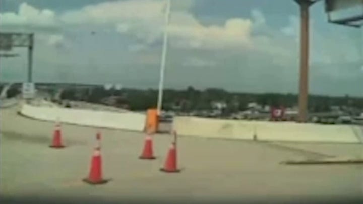 Dashcam video shows Tesla Cybertruck crash into overpass barrier