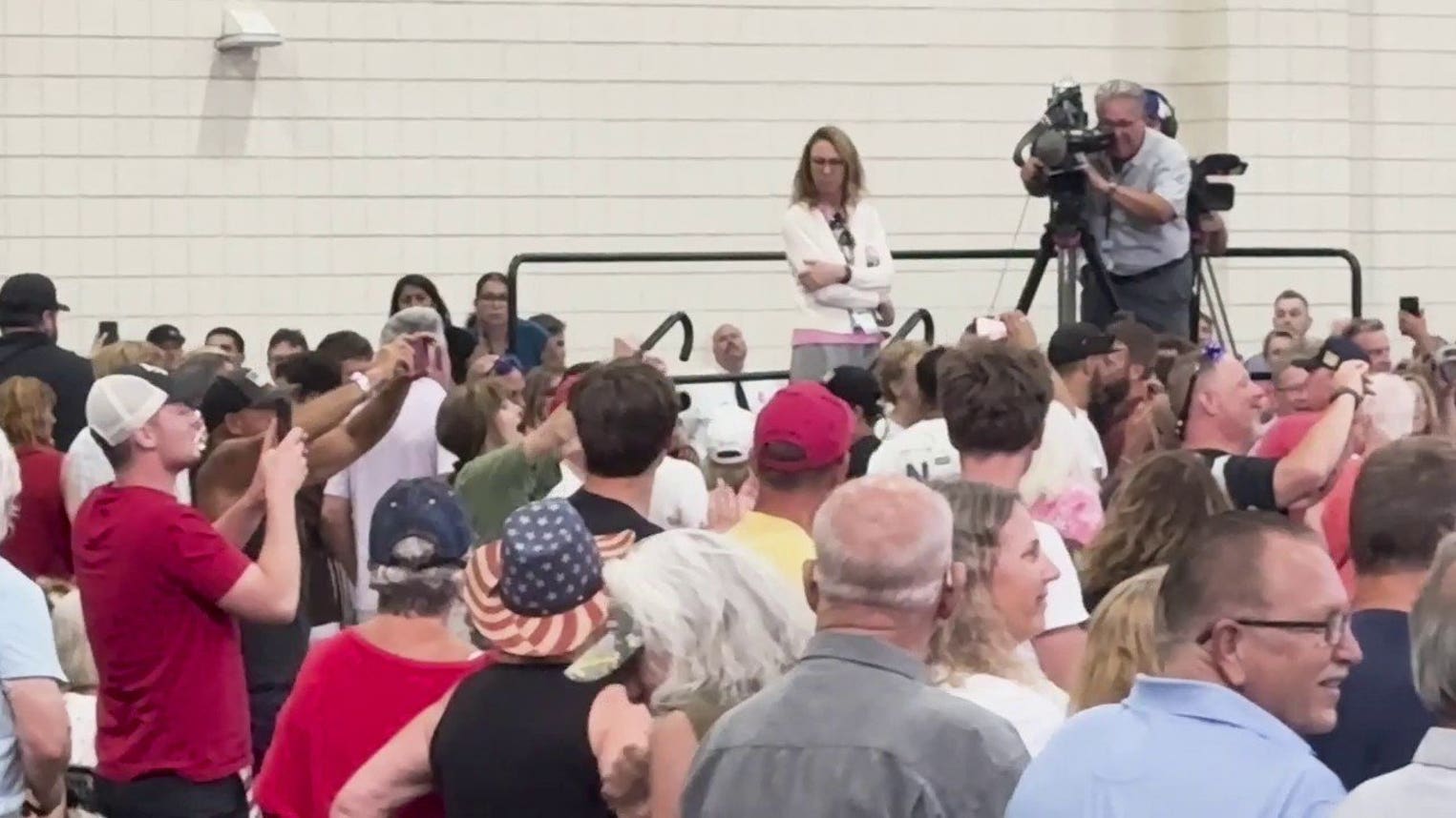 Protester removed by security during Trump speech