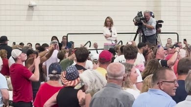 Protester removed by security during Trump speech