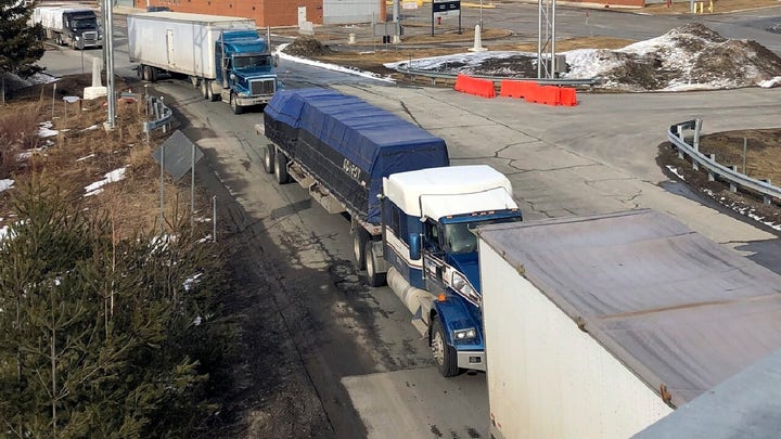 Truck drivers brave coronavirus outbreak to deliver goods