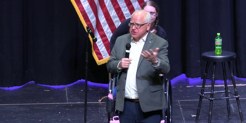 Walz Retracts Tesla Comments Amid Attacks, FBI Warns