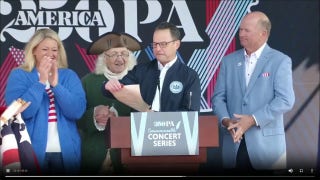 America250 backdrop crashes toward Gov. Josh Shapiro at announcement event