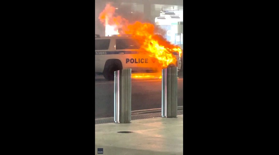 Police vehicle catches fire at LaGuardia Airport in New York City