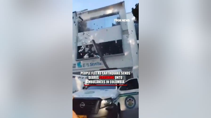 People FLEE as earthquake in Colombia sends debris CRASHING into ambulance