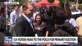 California voters head to polls for primary voting amid tight Los Angeles mayoral race