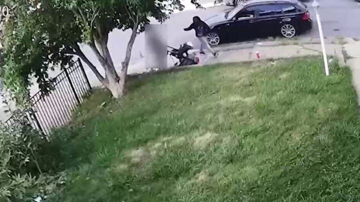 Shows woman shoot at mother and baby in stroller at point blank range