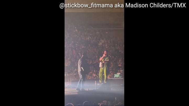 Zach Bryan scolds fan for throwing object on stage during concert