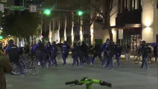 Austin Police Department in riot gear detain anti-ICE protests