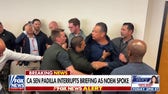 Reactions pour in after Democratic senator was removed from Noem press conference