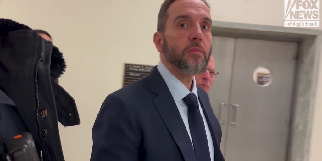 Jack Smith silent as he arrives for House deposition