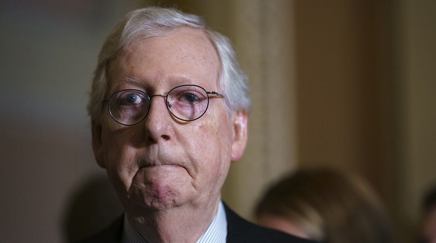 Mitch McConnell targets longtime Sen. Bob Dole aide 