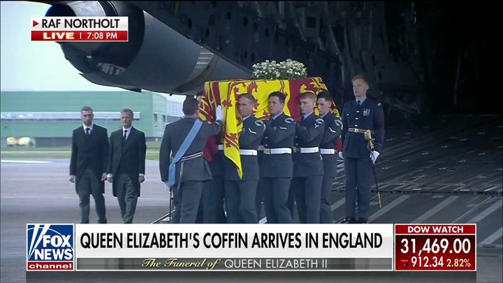 Queen Elizabeth II’s coffin returns to London