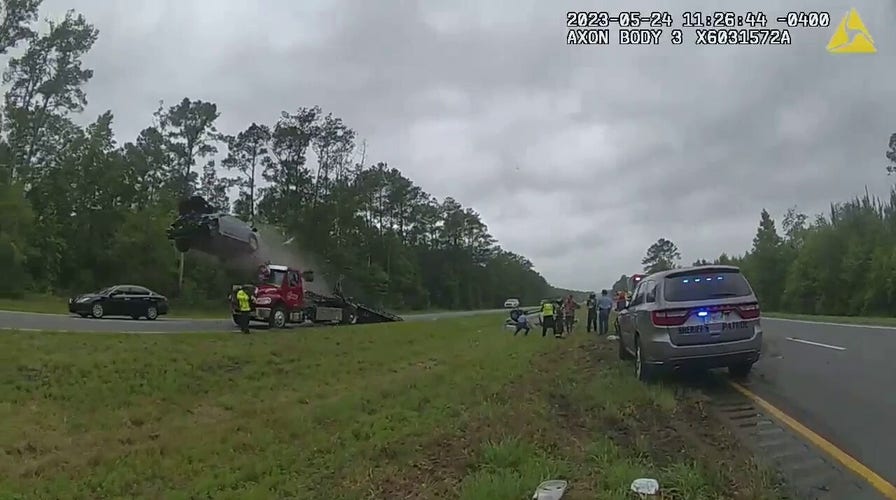 Video captures Georgia car launching off tow truck ramp on highway