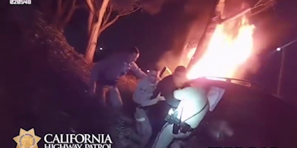 California Highway Patrol officers rescue man trapped in burning vehicle