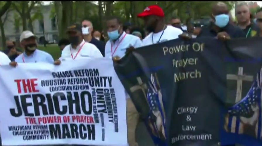 Protesters clash with police at pro-police march organized by clergy