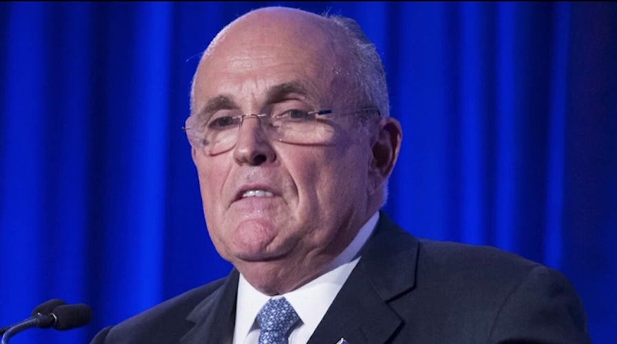 Federal agents raid Rudy Giuliani's New York City apartment