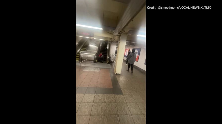 Two people fighting at NYC’s Grand Central tumble down escalator as shocked onlookers move out of the way