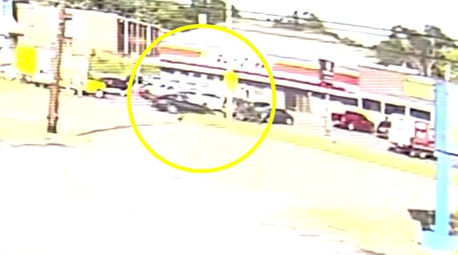 Memphis shooting: Surveillance footage shows suspect's car pulling into the Autozone parking lot before allegedly firing two shots in the store