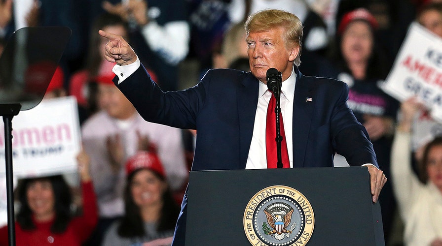 Trump slams impeachment trial at New Jersey rally